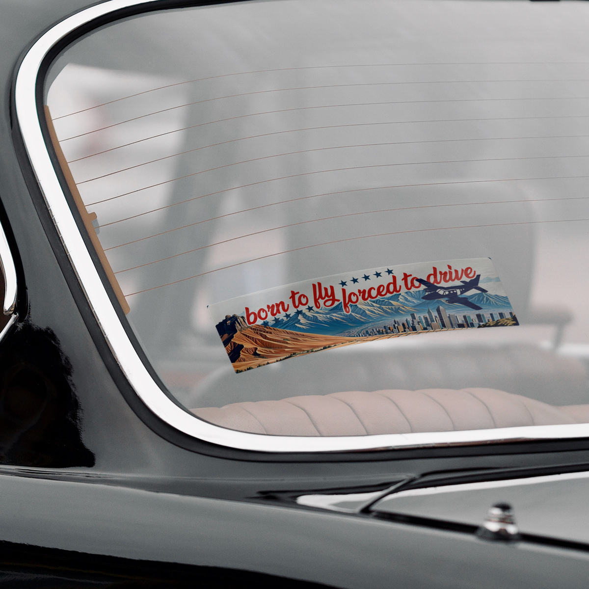 Born_to_fly_forced_to_drive_bumper_stick_ClearBumperSticker_Windshield_Mockup.png_15837404